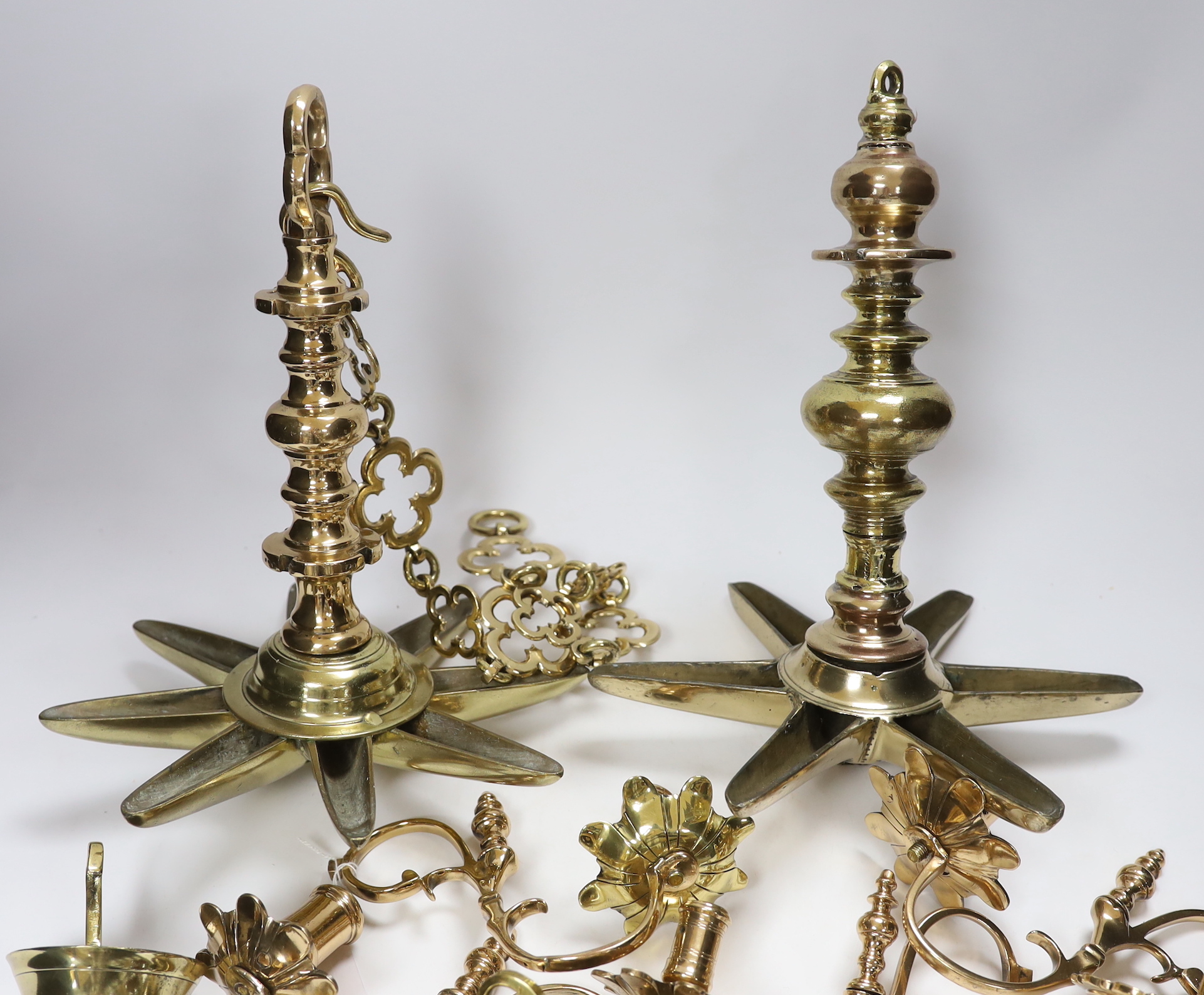 Judaica - two brass Sabbath lamps, one including chain (2), tallest (including chain) 95cm long, and associated arms etc.